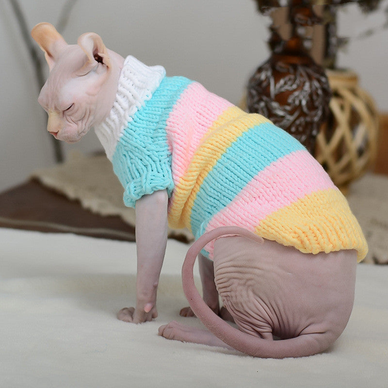 Cat sweater with pastel rainbow stripes (light blue, pink, yellow) and white turtleneck