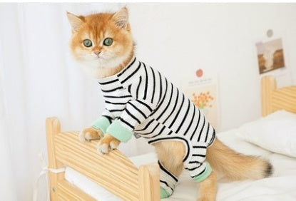 Black-and-white striped cat onesie with green paw accents, four-legged