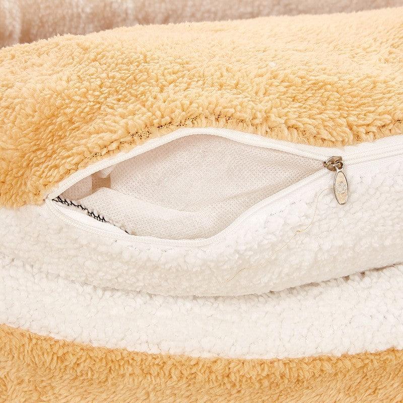 Beige removable pet nest insert with visible zipper opening and white trim