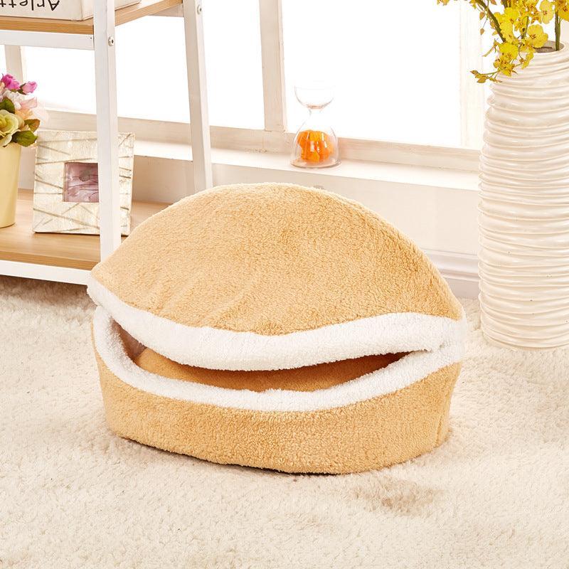 Beige plush pet nest with white inner rim, round top view