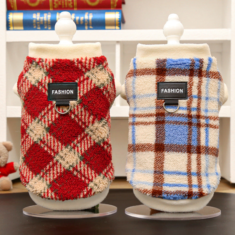 Pair of plaid polar fleece dog jackets with leash ring: red-and-cream and blue-and-cream.