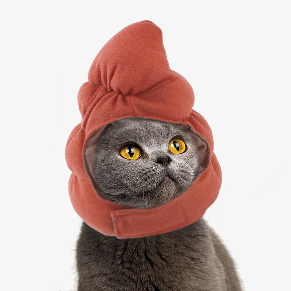 Pet hood hat in rust orange with a large front bow and an opening for the cat’s face