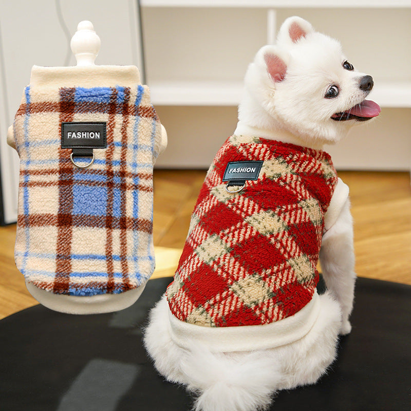 Plaid polar fleece dog jacket with leash ring, red-and-blue and cream patch pattern.