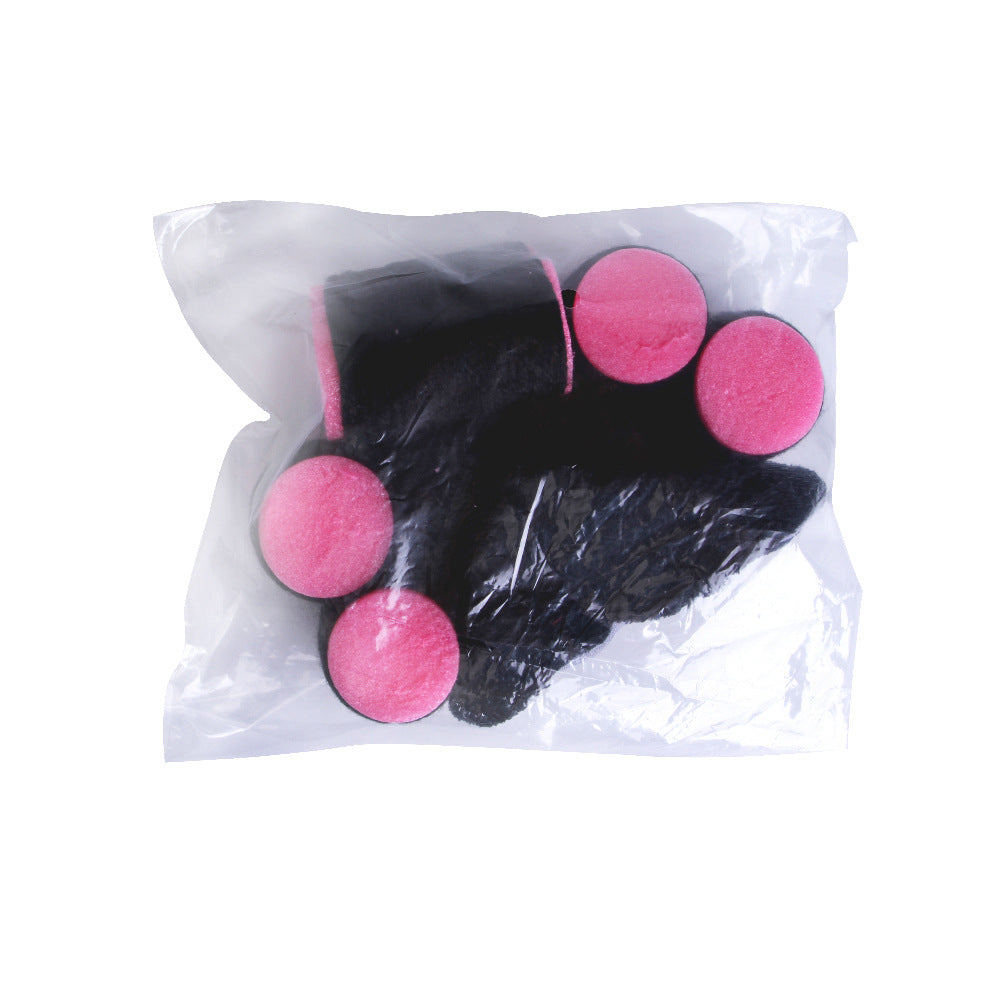 Black pet hat with pink pom-poms, blue lining, shown folded in packaging