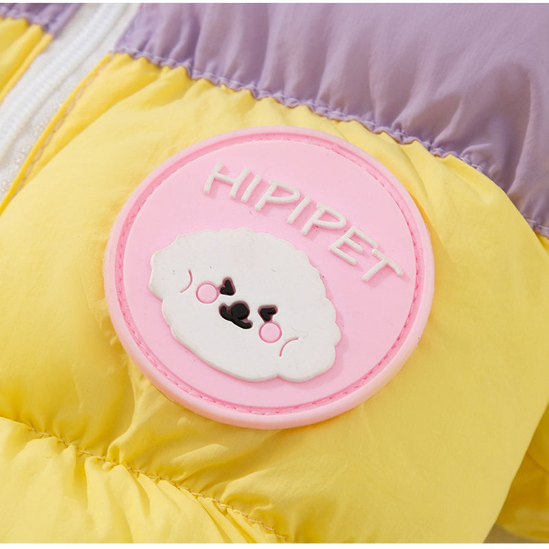 Color-block puffer dog jumpsuit with pink circular Hipiper patch on yellow padded chest