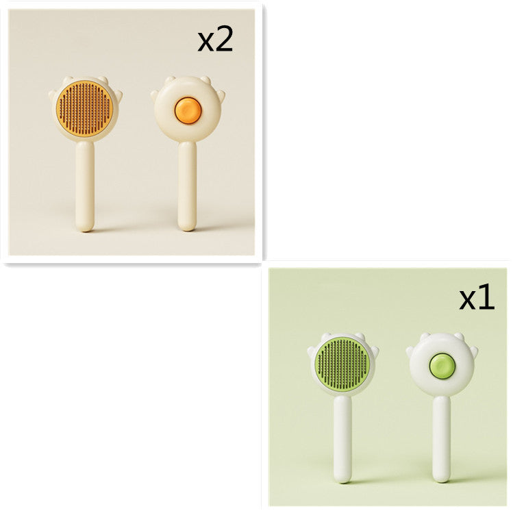 Pet grooming comb brush set with orange round pin heads and cream white handles