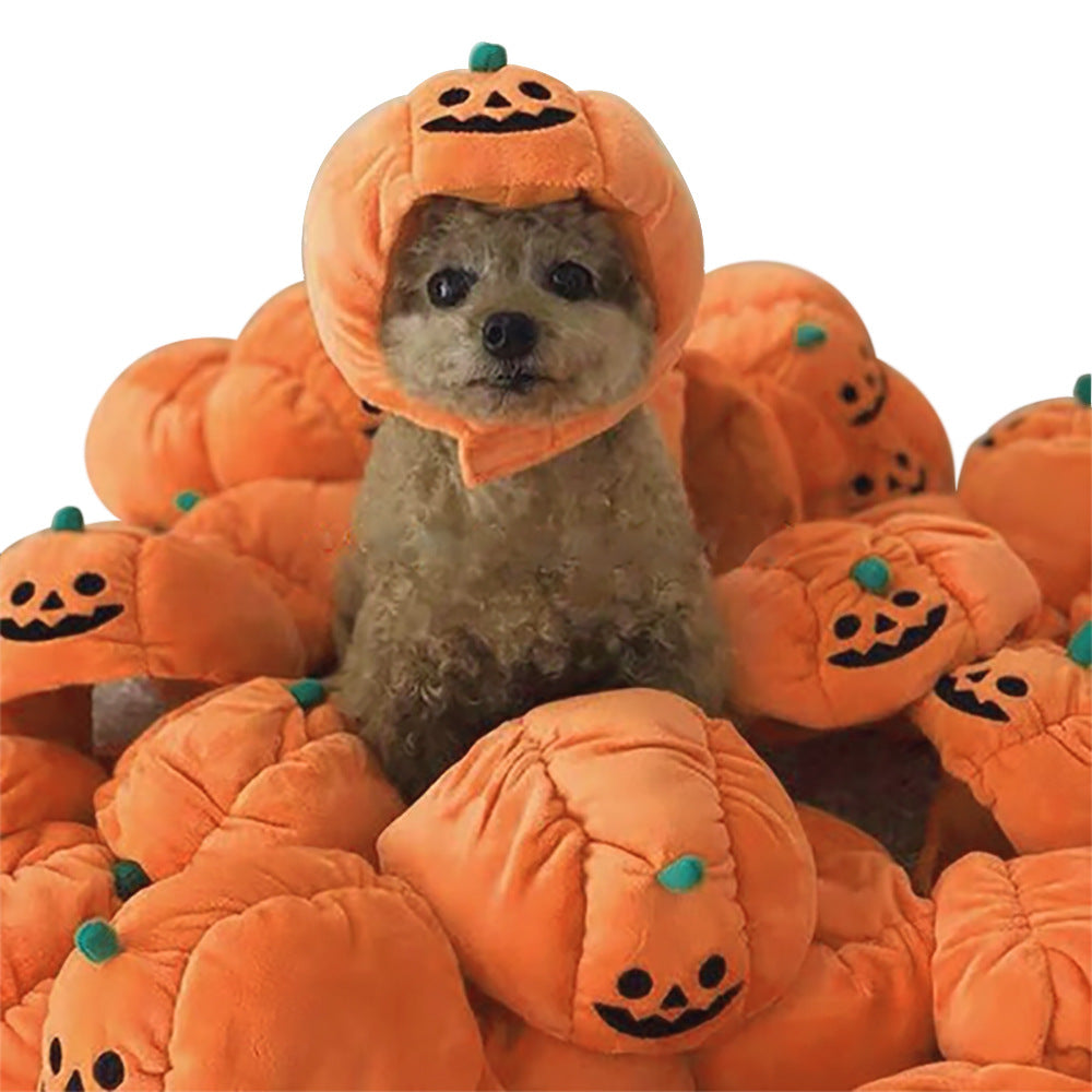 Orange pumpkin pet hood hat with jack-o-lantern face and a front opening for the dog’s head