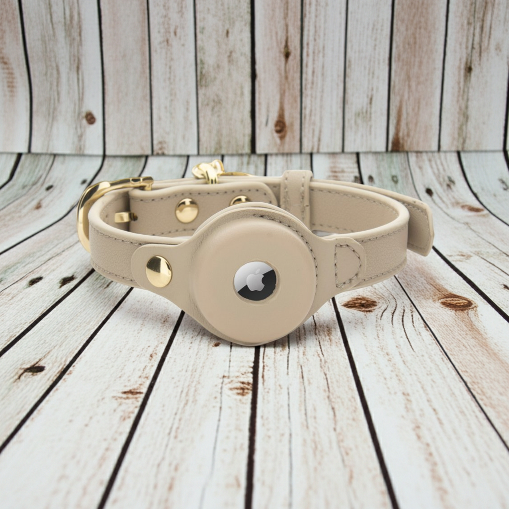 Beige vegan leather pet collar with gold hardware and circular AirTag holder