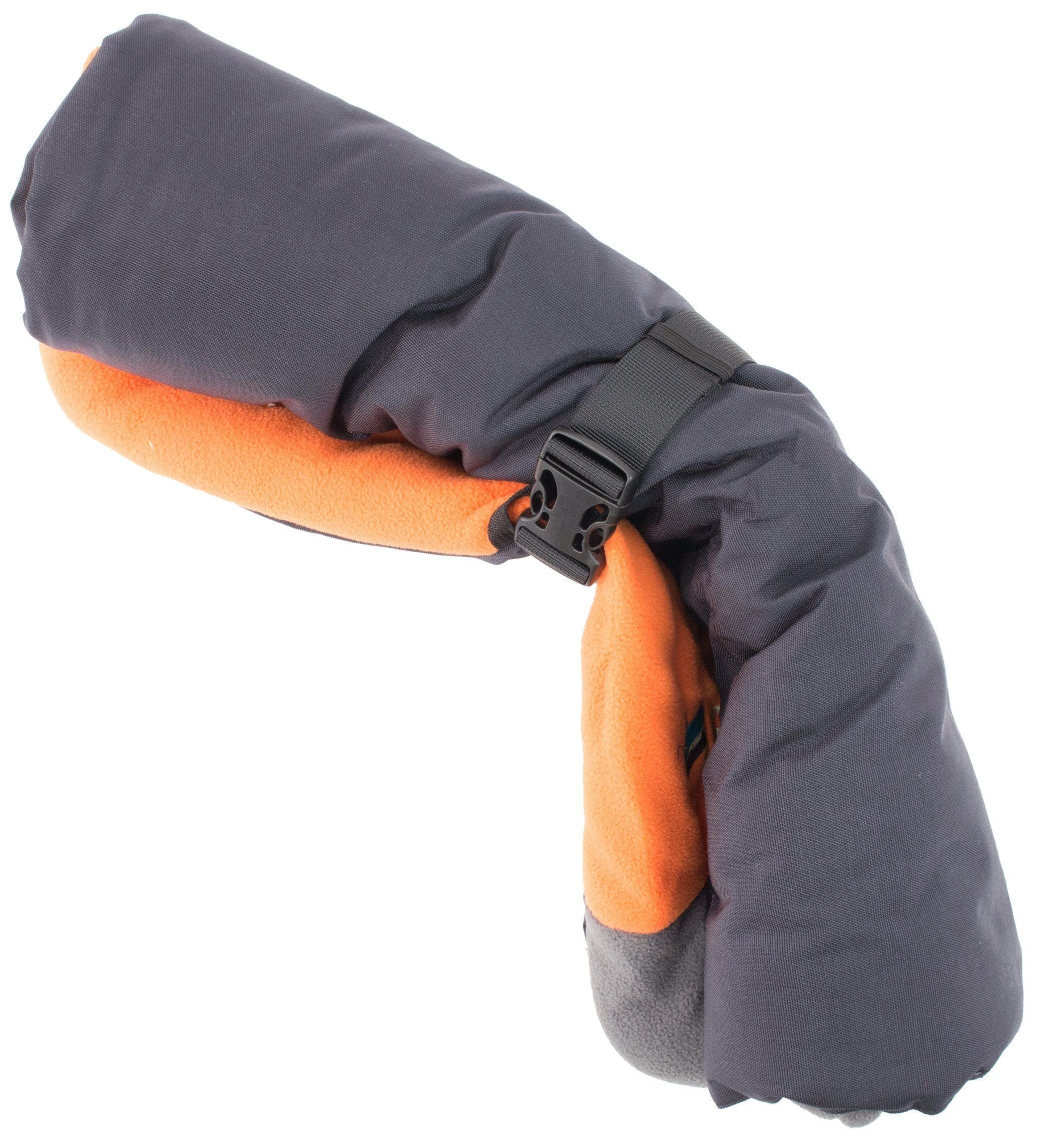 Reversible dog travel bed with gray outer and orange fleece padding, fastened with buckle strap