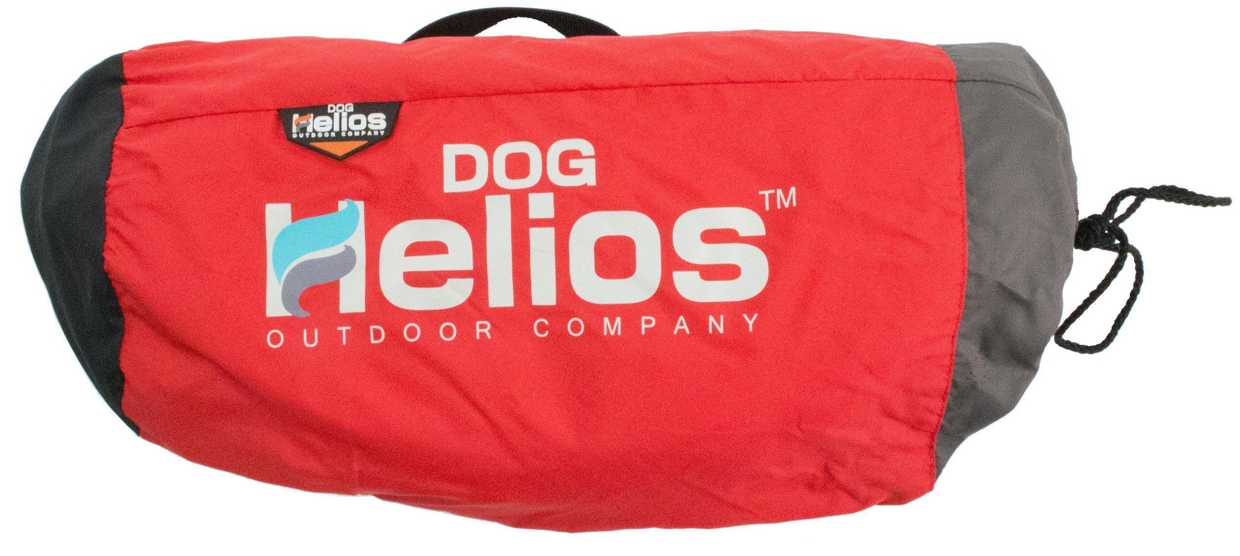 Rolled dog bed cover in red fabric with DOG Helios outdoor logo on gray backing
