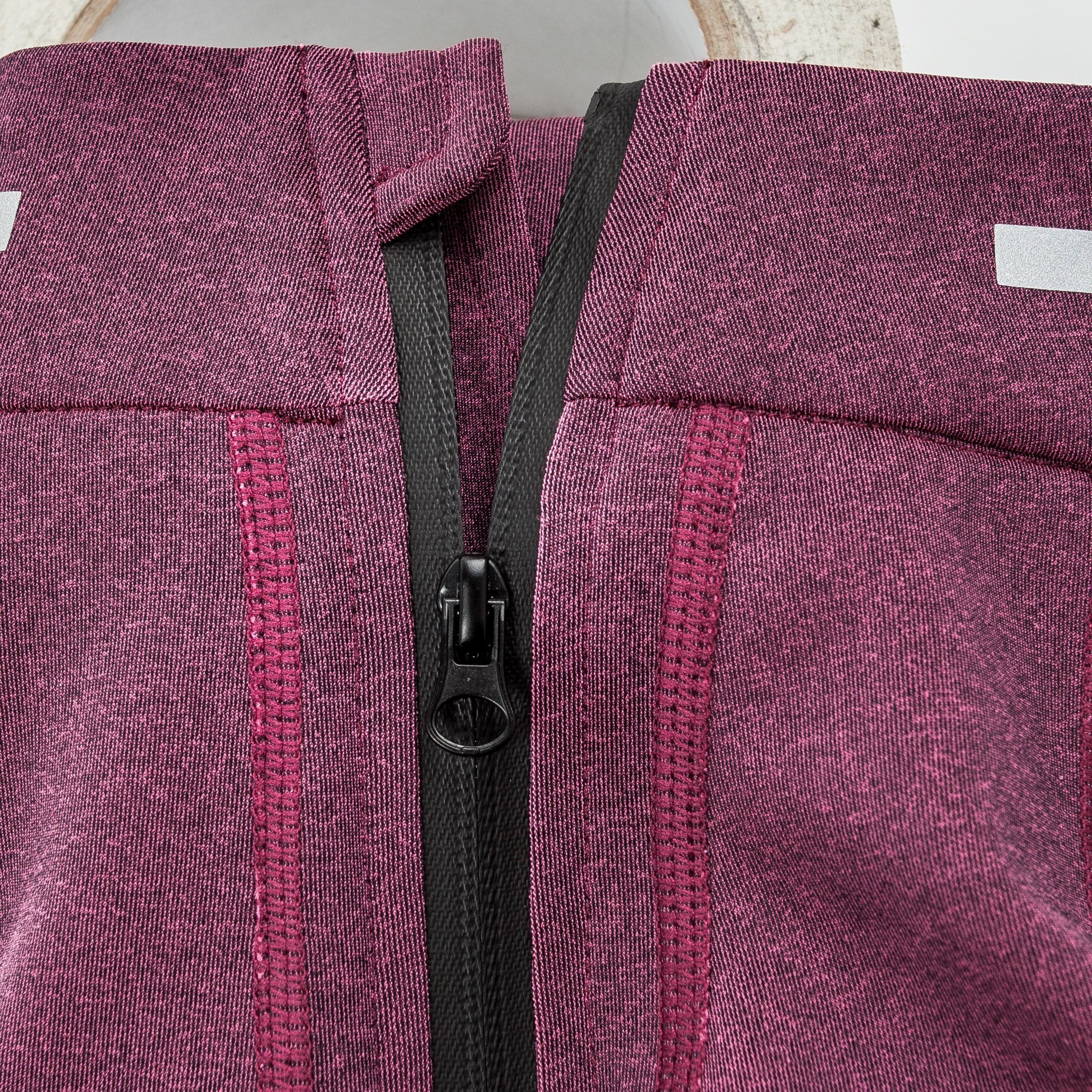 Dark pink dog yoga shirt with gray trim and front zipper