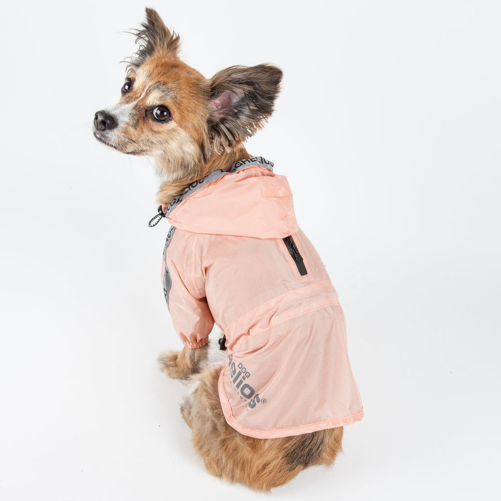 Peach waterproof dog raincoat poncho, side view with hood and fastener details