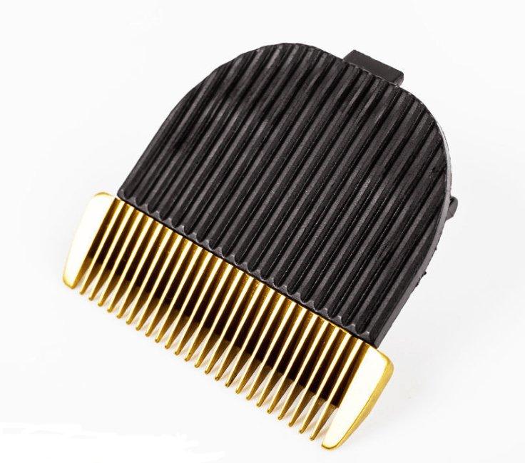 Clipper comb attachment with gold teeth and black ridged cover