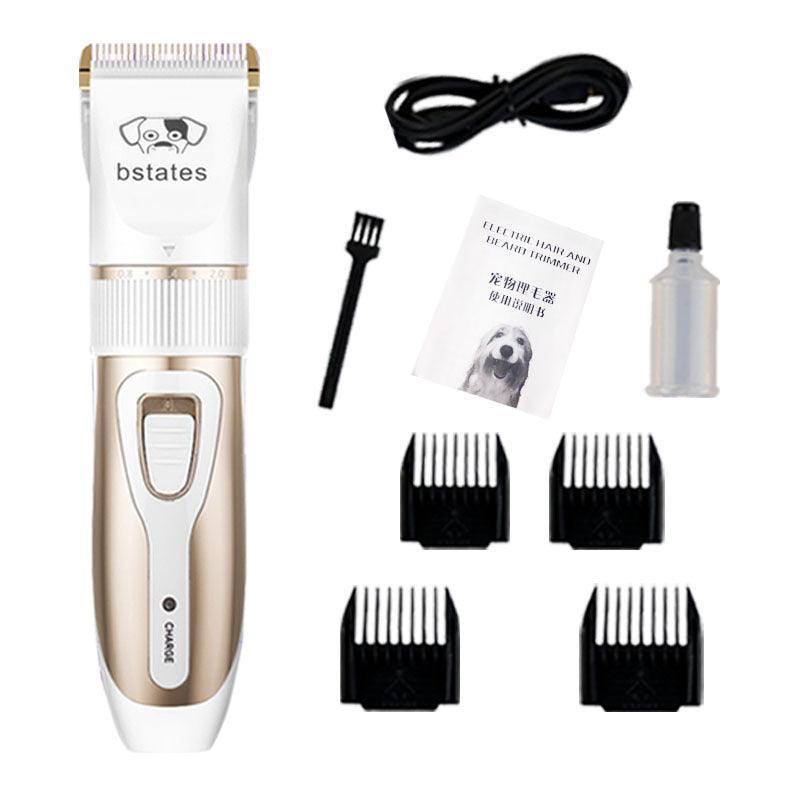 White and gold pet hair clipper with power cord, spray bottle, and blade attachments