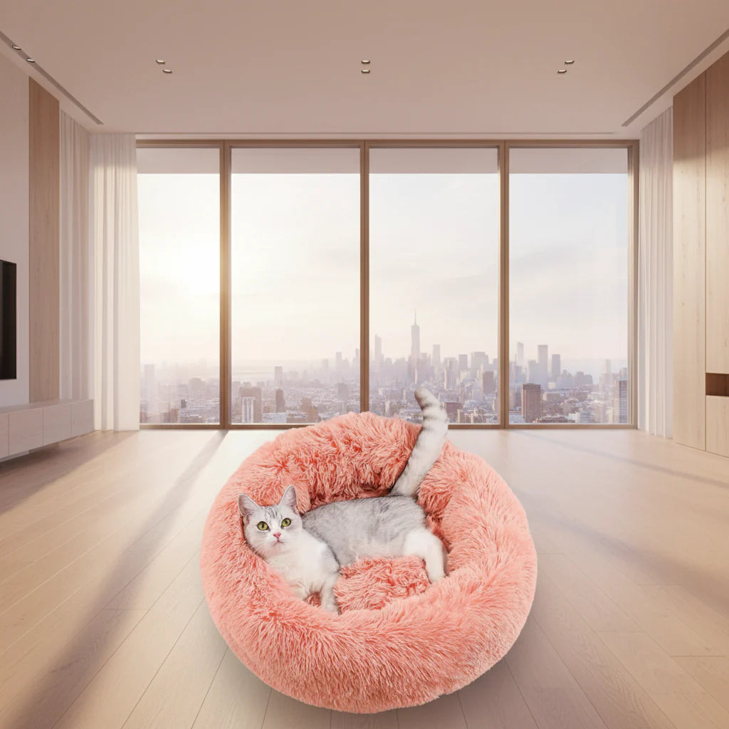Pink round donut pet bed plush nest with raised rim, soft shaggy texture