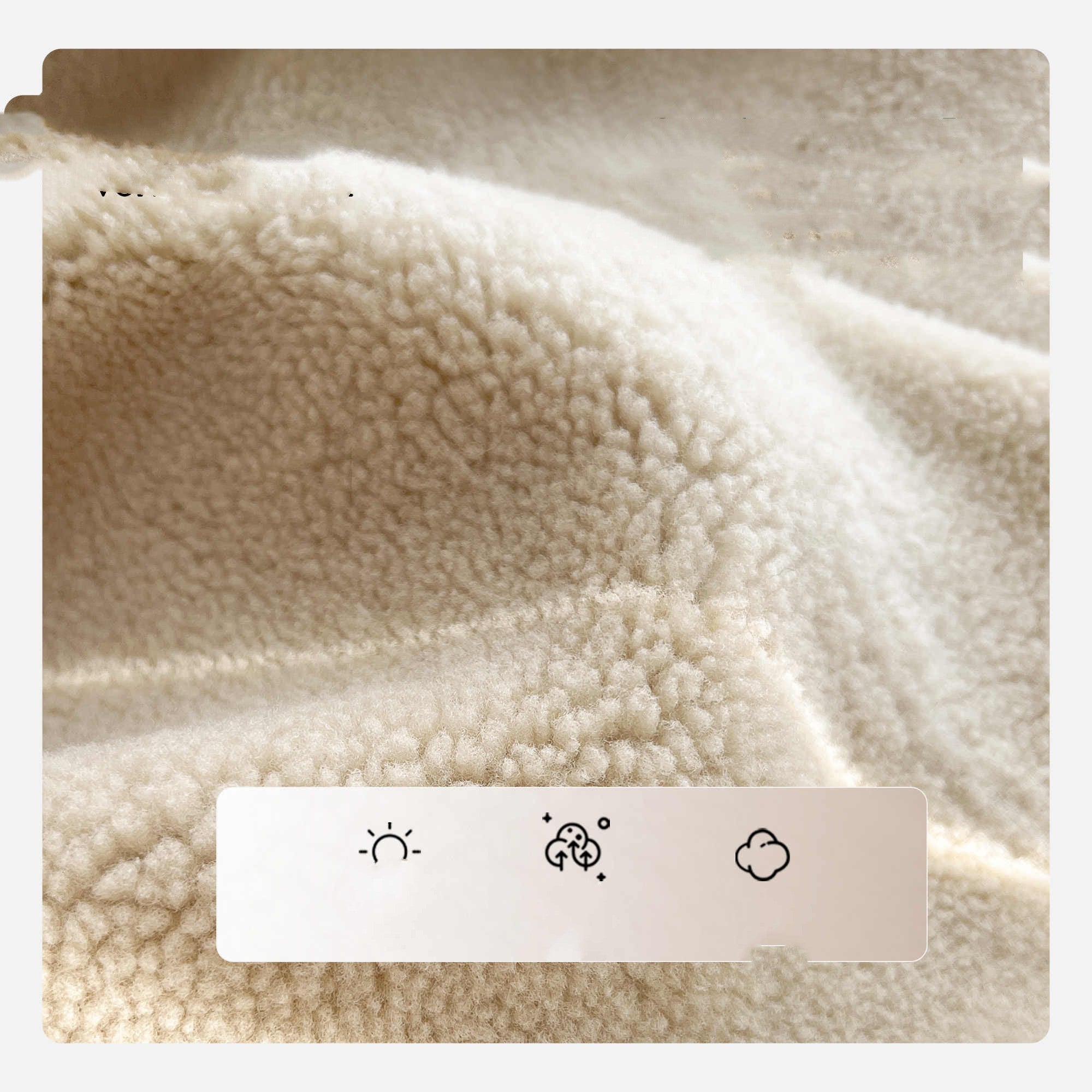 Cream sherpa lining close-up with textured fabric and stitched trim on a jacket