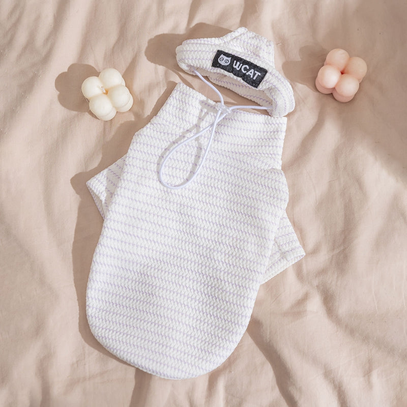White two-legged pet shirt set flat on a light background, hood and dangling drawstring