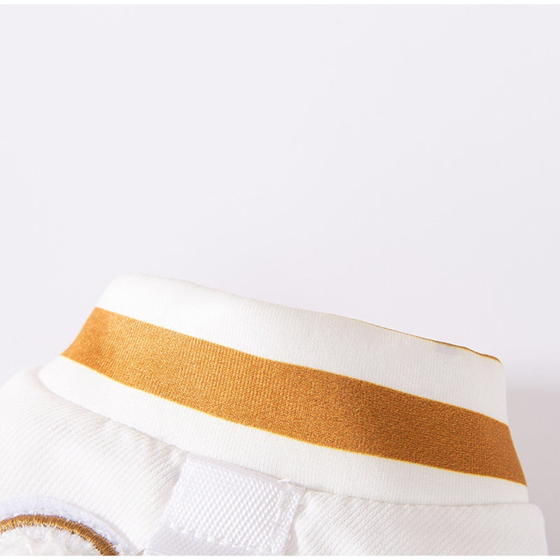 White pet jacket with tan/gold horizontal stripe panel and striped collar