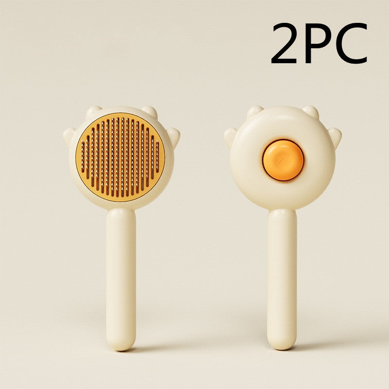 Pet grooming comb brush with orange round pin massage head and white handle