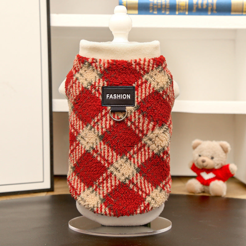 Plaid polar fleece dog jacket with leash ring, red-and-cream diamond check pattern.