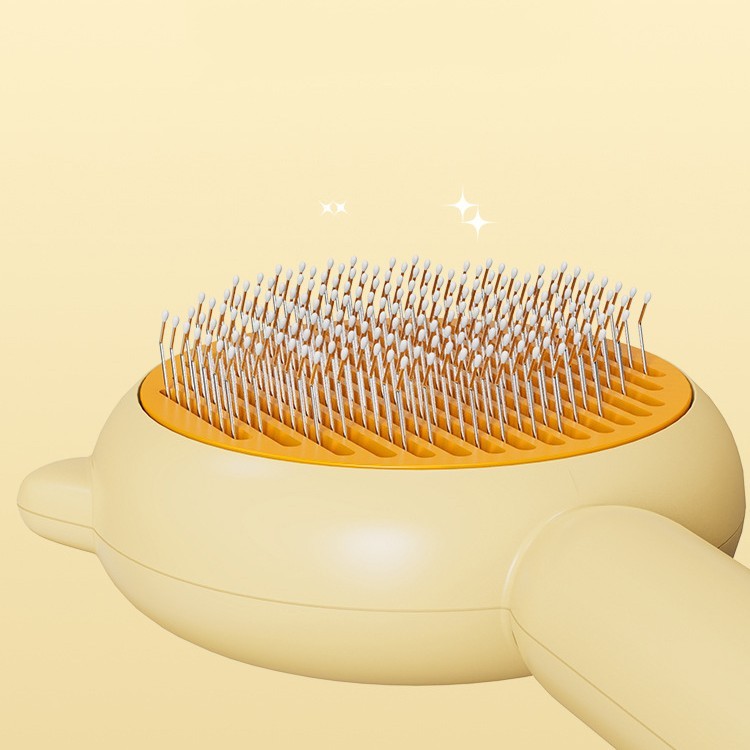 Pet grooming brush with curved base and dense white bristle pins on amber head