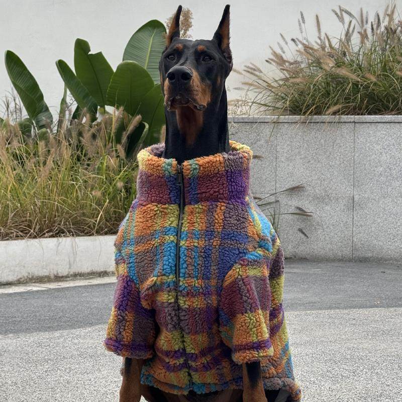 Dog fleece-lined coat in colorful plaid fleece, zipped front and rounded hood-like collar.