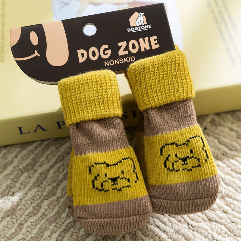 Yellow and brown dog socks with bear face knit designs and ribbed cuffs