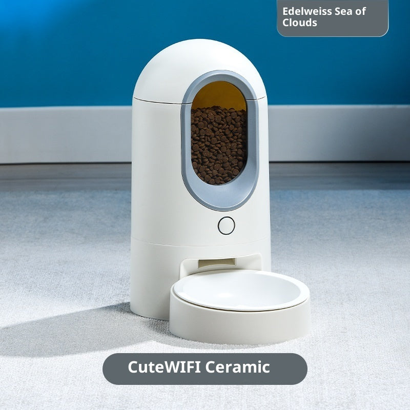 White smart pet feeder with ceramic feeding bowl and front viewing window