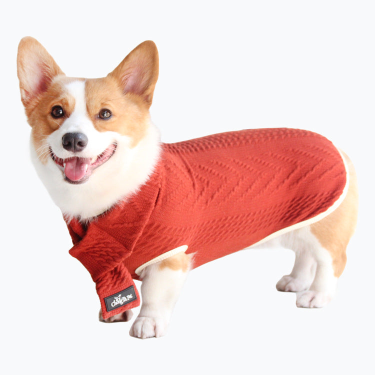 Red cable-knit pet sweater with white edging and small logo patch