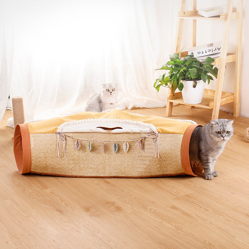 Beige cat tunnel with green end rims, leaf charms, white and gray cats near openings