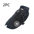 Black waterproof dog jacket with fleece lining and reflective harness straps, front view