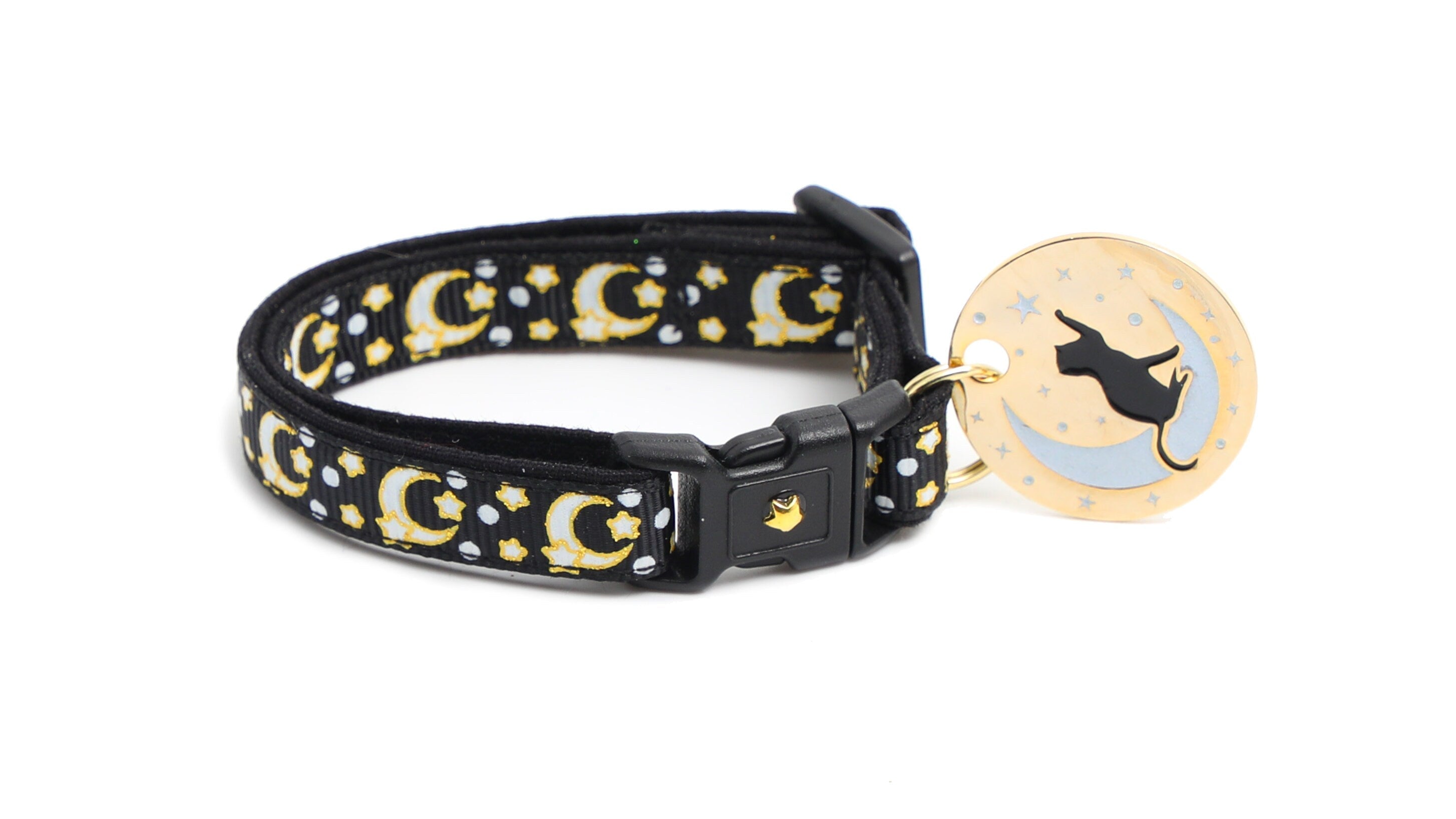 Gold moons and stars on black cat collar with oval cat silhouette charm