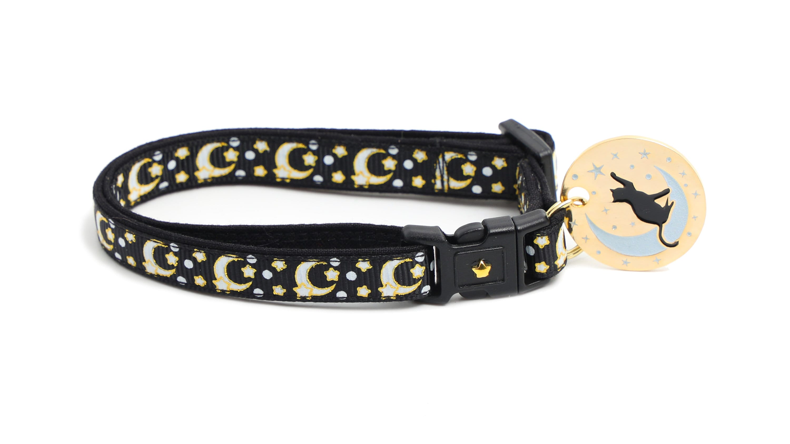 Gold moons and stars on black cat collar with oval charm and cat silhouette
