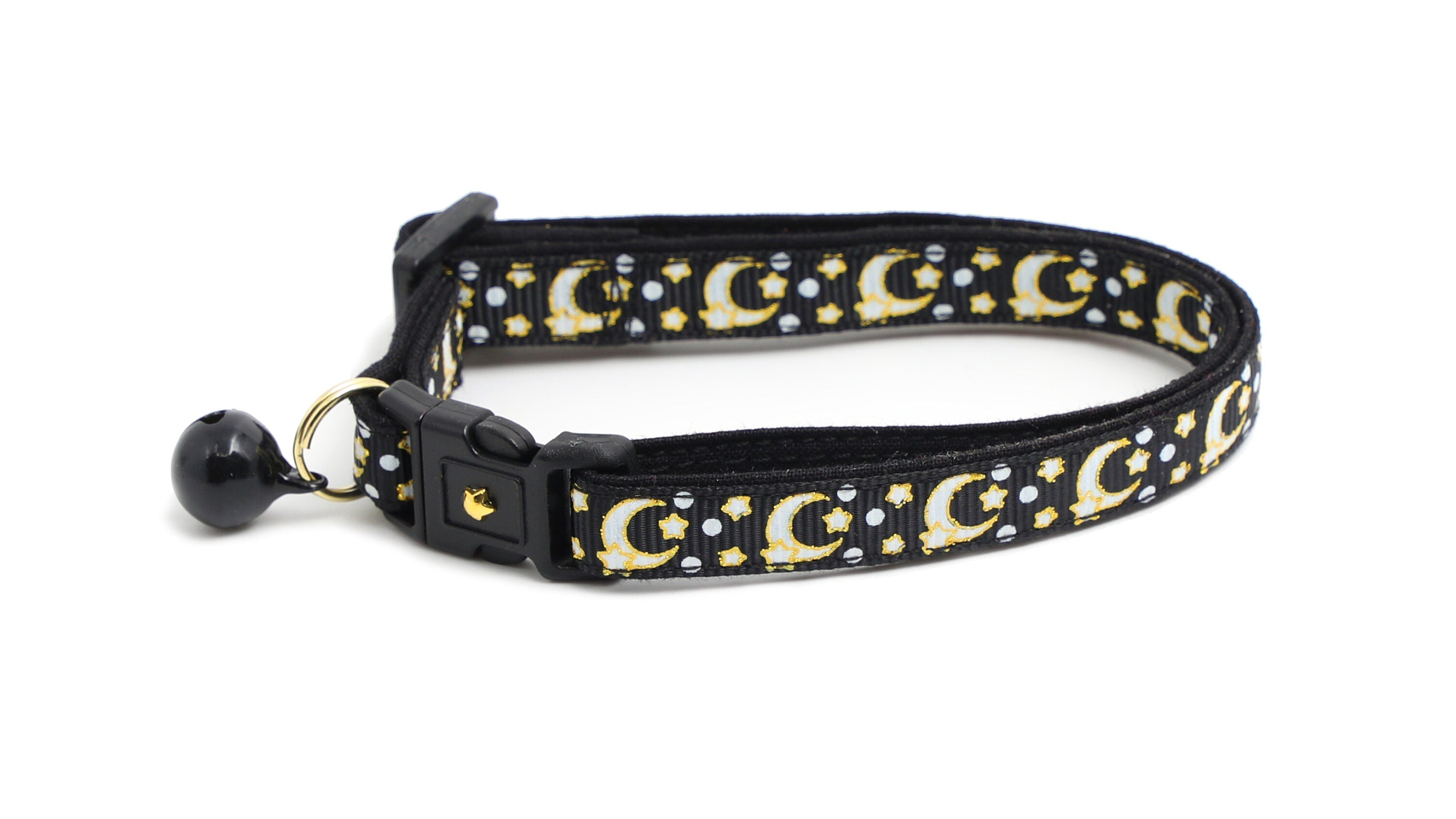 Black cat collar with gold moons and stars print and black buckle strap