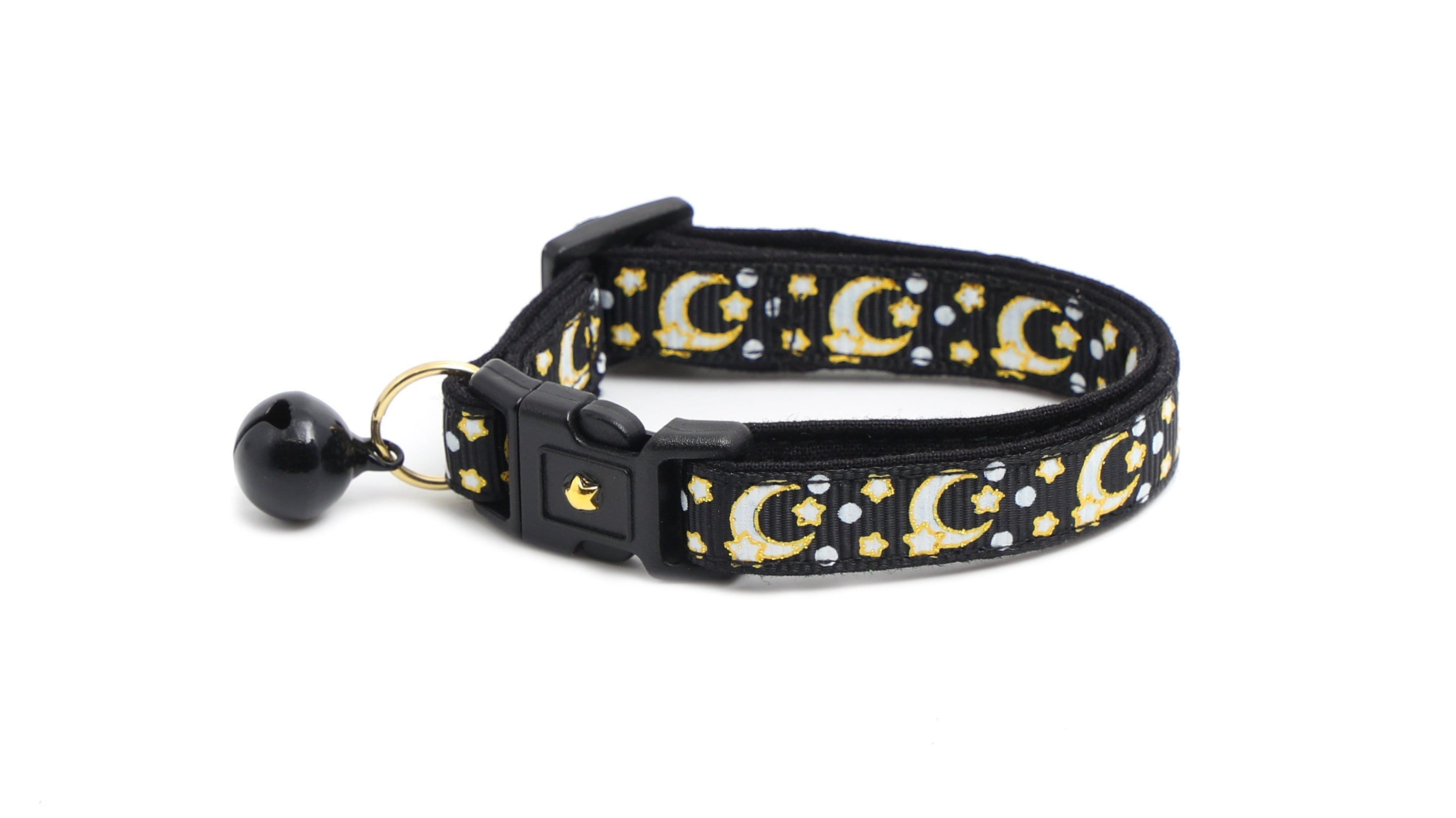 Black cat collar with gold moons and stars pattern and black bell