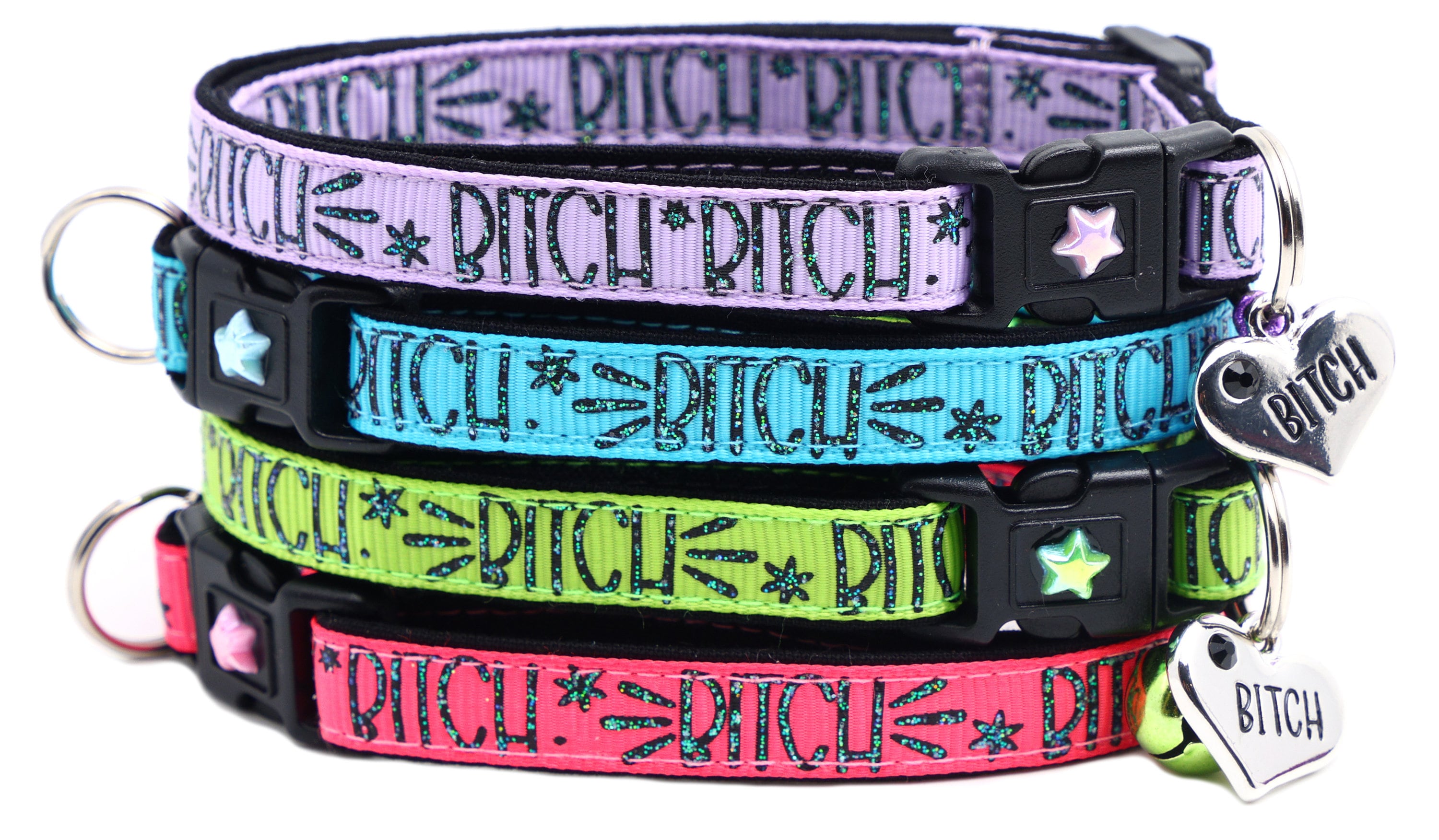 Breakaway cat collar set with pink, blue, green and purple straps, star and heart charms.