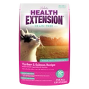 Grain-free turkey and salmon cat food pouch with magenta front label and logo