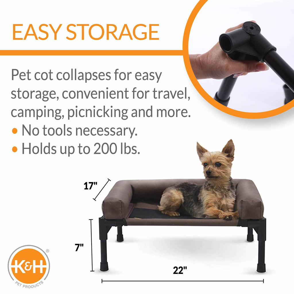Collapsible bolstered pet cot, chocolate fabric and black frame, folded for storage
