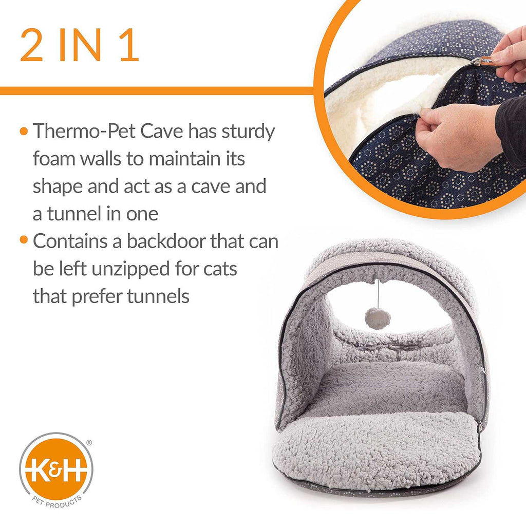 Heated cat cave bed with unzipped backdoor view, grey plush interior walls and floor