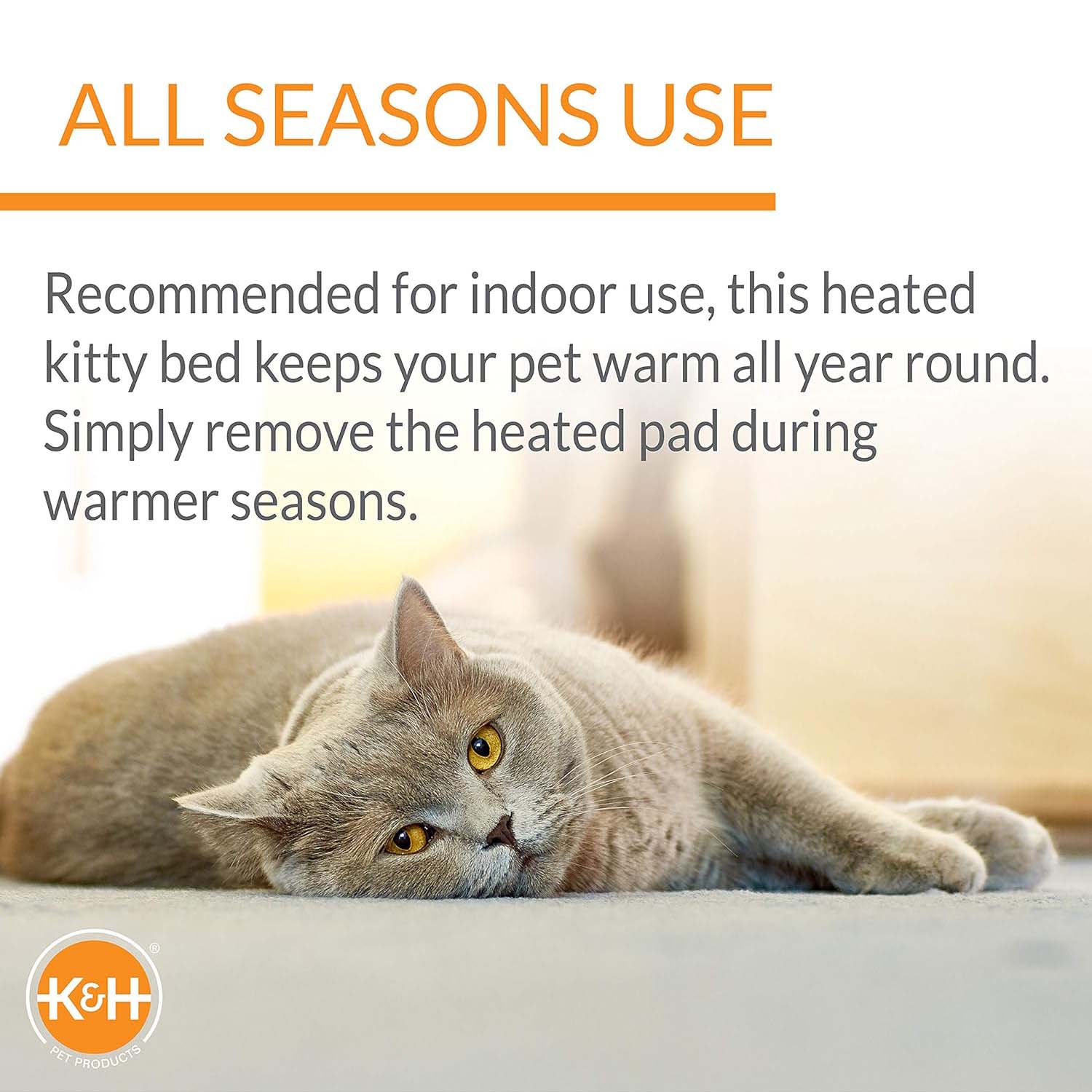 Heated cat bed cover with cat lying down
