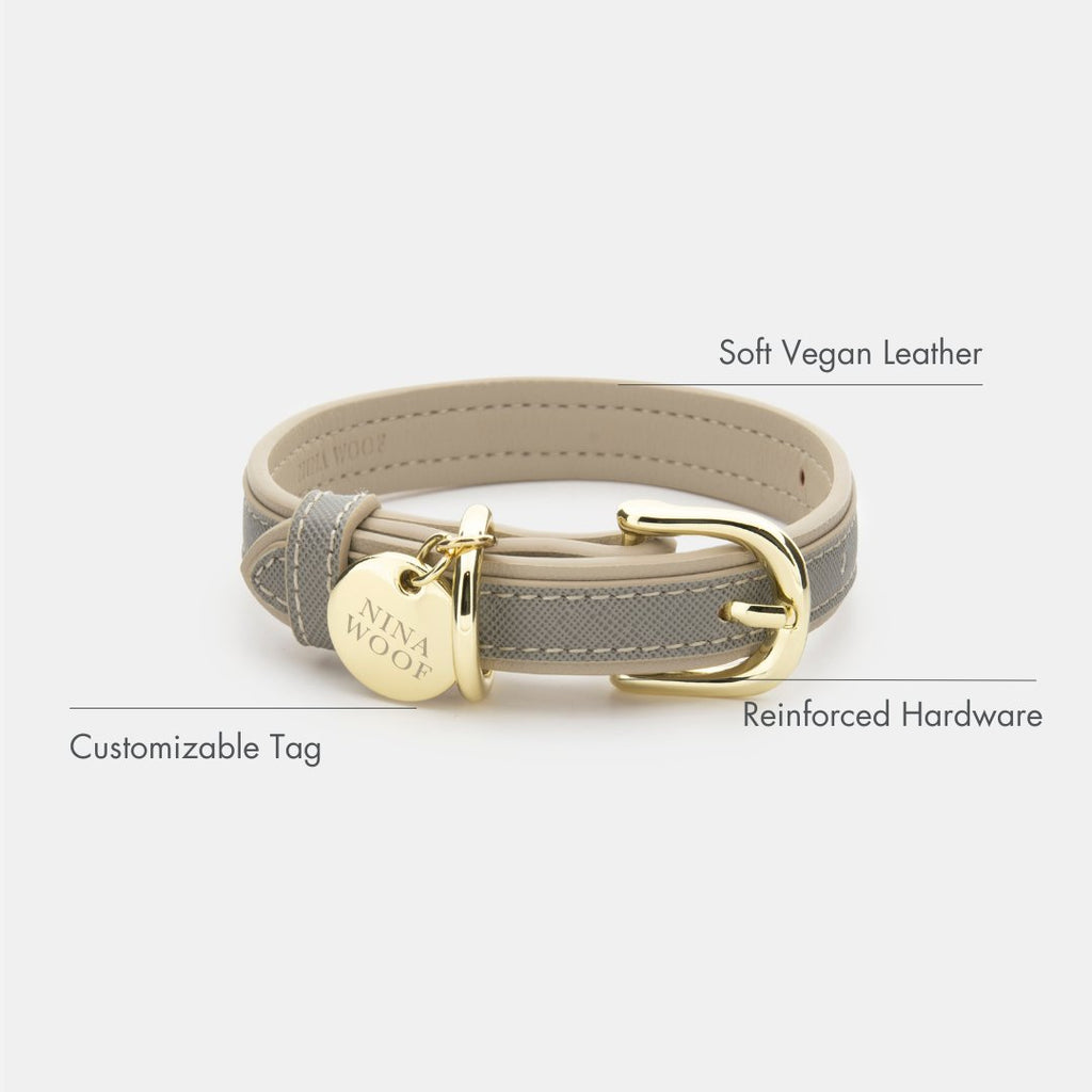 Grey vegan leather dog collar with gold hardware and engraved round tag