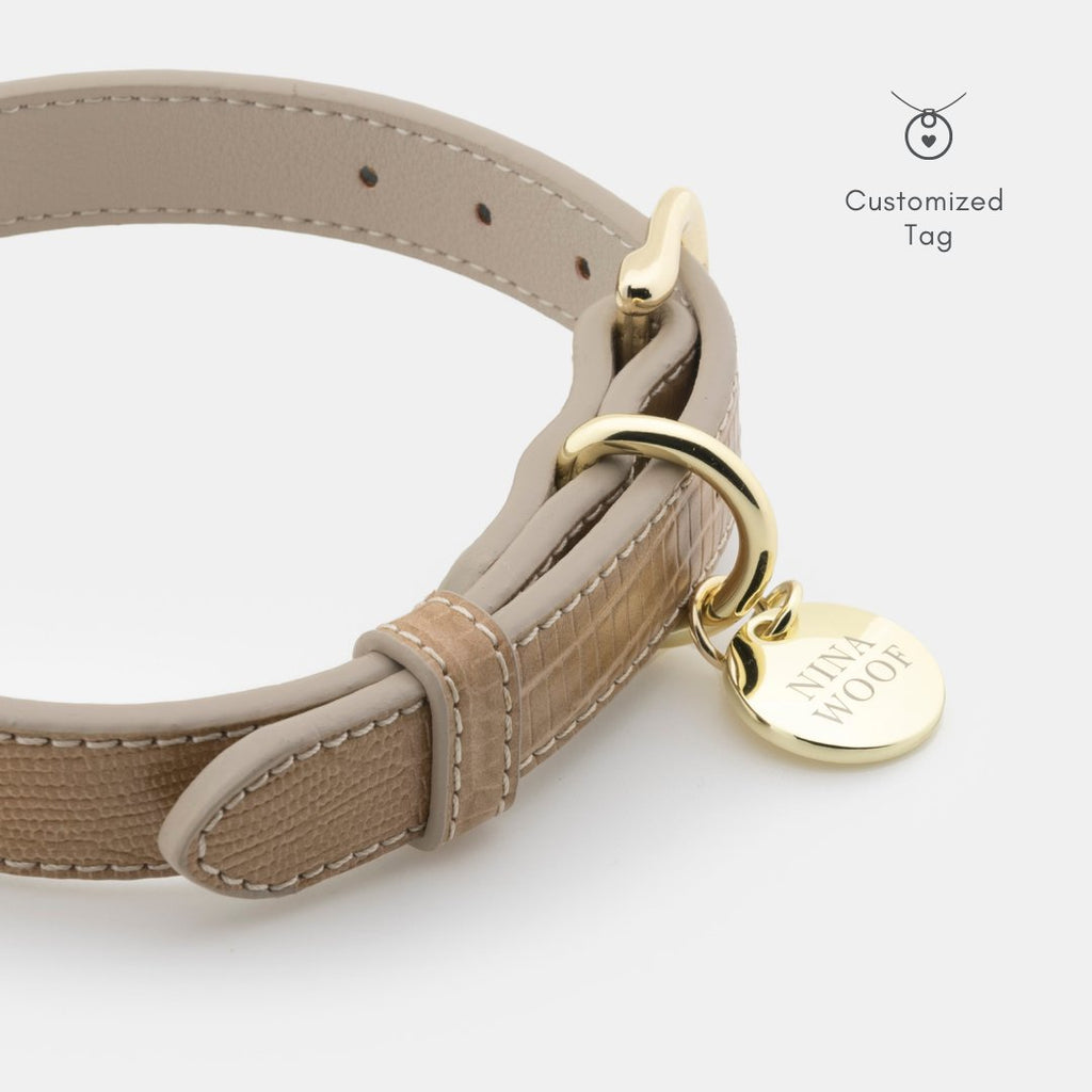Beige Milan collar with gold D-ring, clasp, and customized round name tag