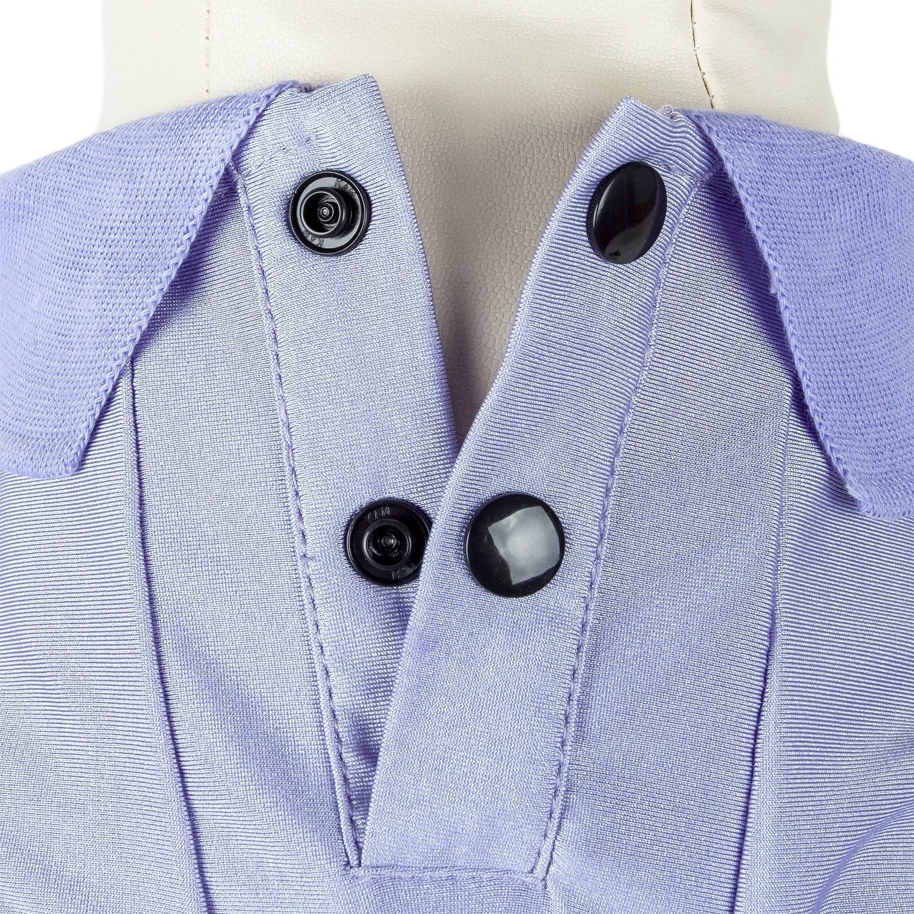 Light blue dog polo close-up: snap buttons and stitched placket