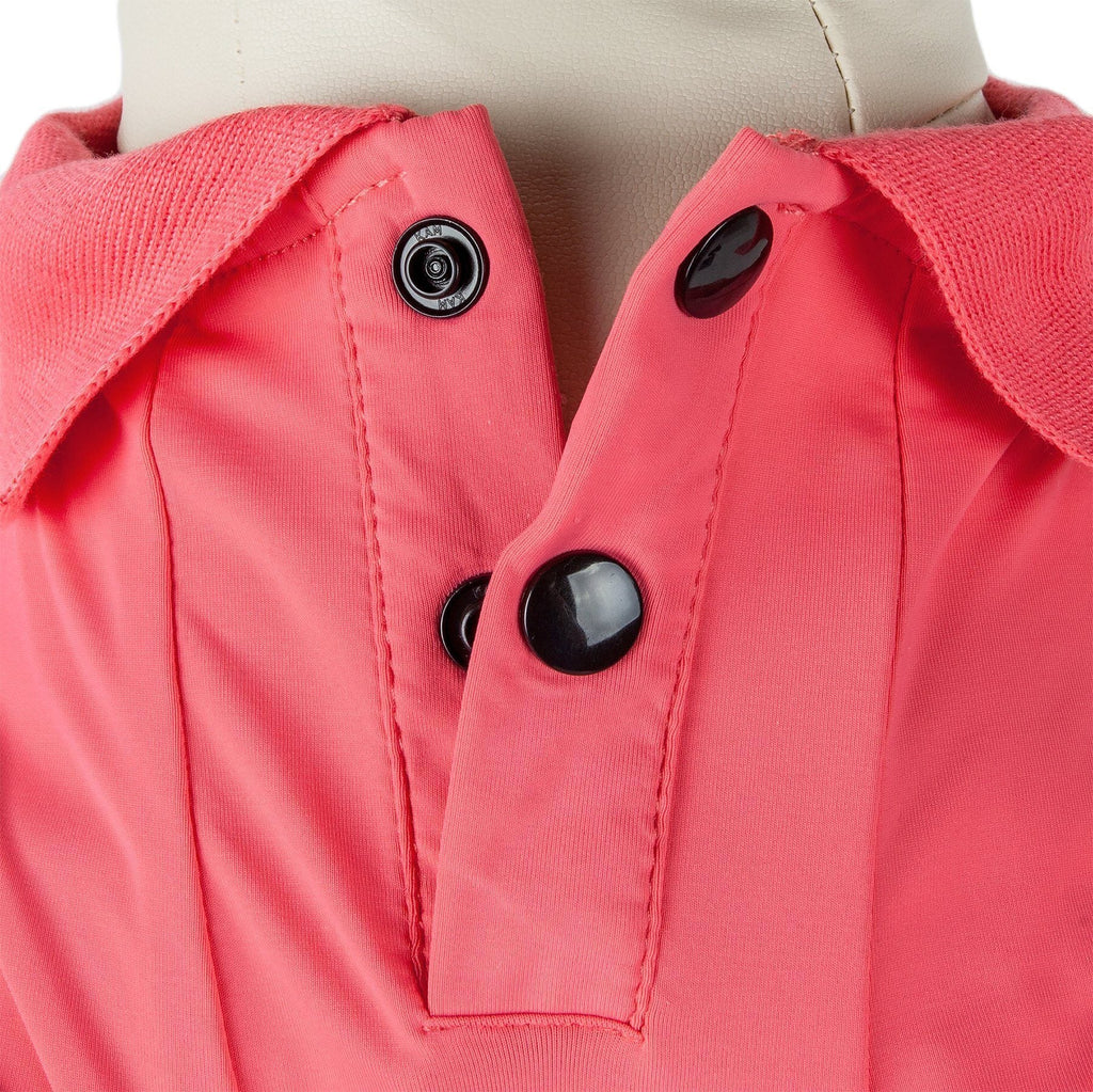 Pink dog polo close-up: snap buttons on front placket