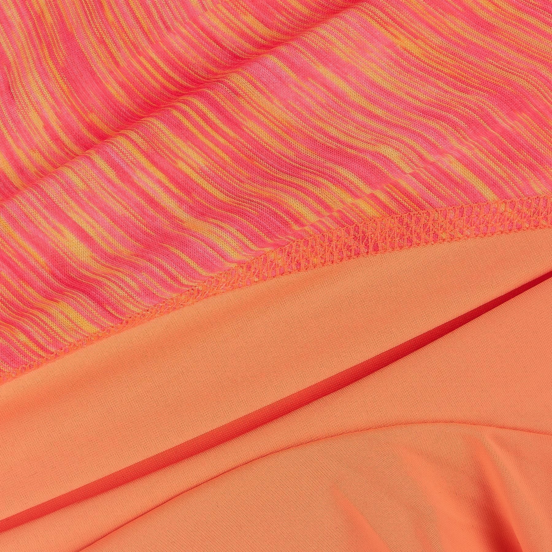 Close-up of orange and pink heather stripe fabric for dog yoga tracksuit hoodie