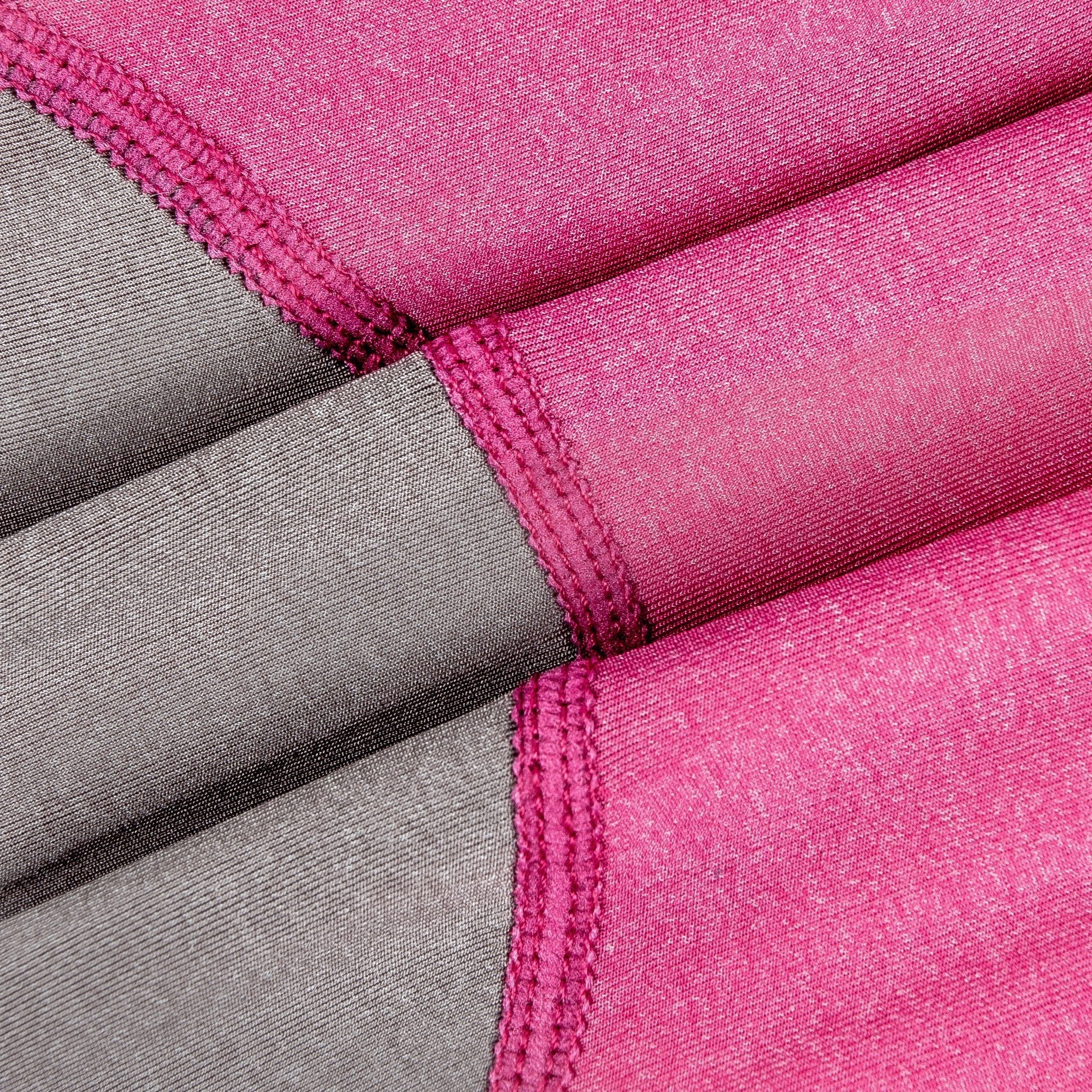 Pink and gray dog tracksuit fabric with stitched seam detail