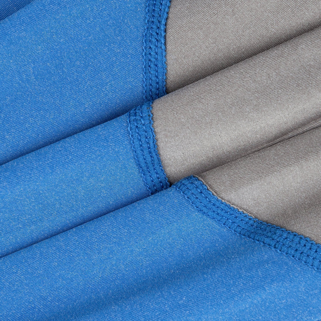 Blue full-body dog tracksuit with stitched trim and stretchy fabric panels