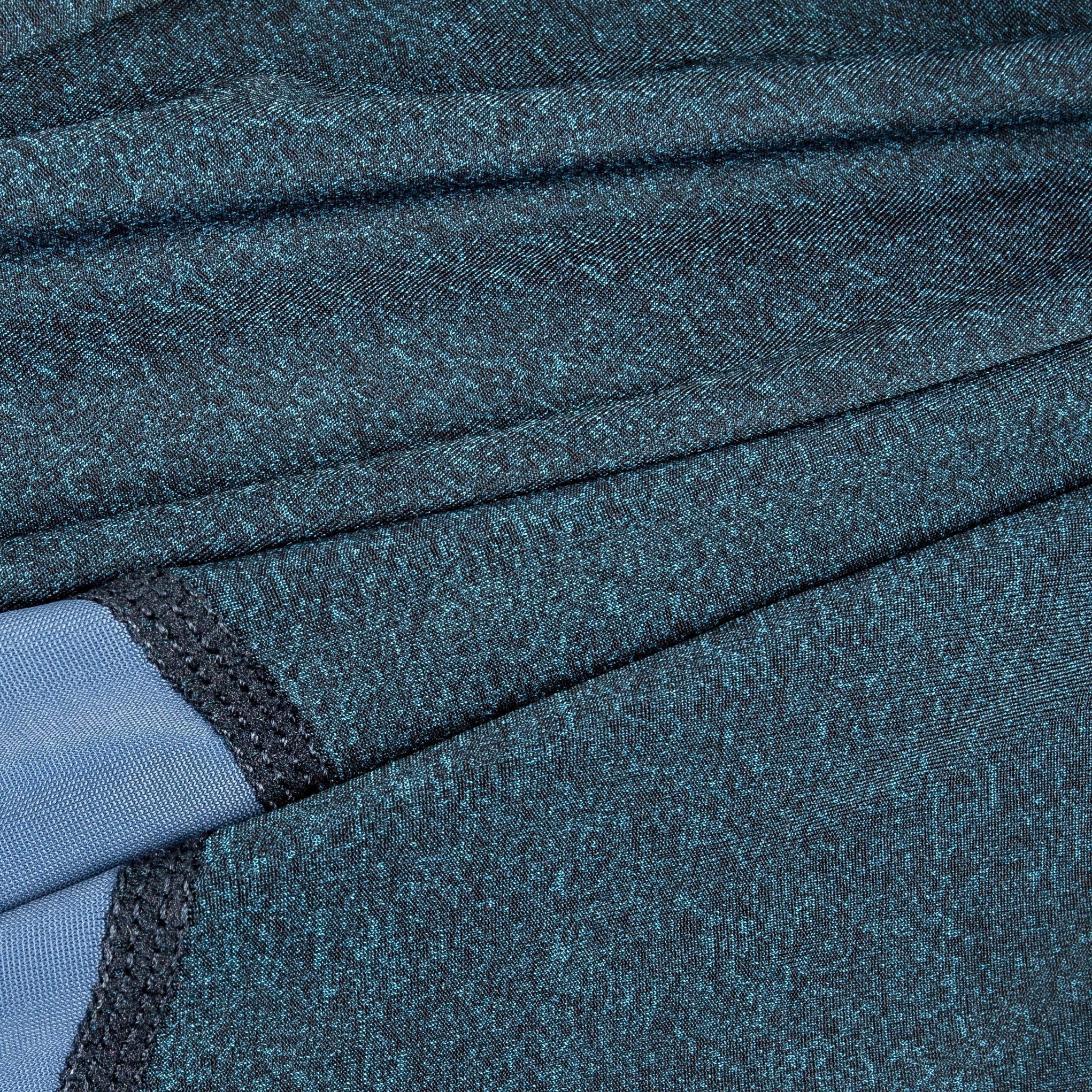 Heathered blue full-body dog tracksuit with seam stitching and knit stretch fabric