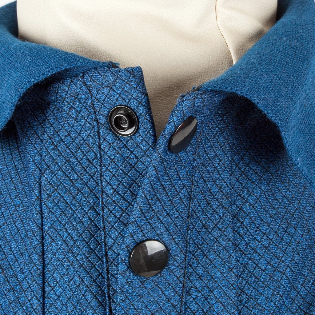 Navy dog polo shirt close-up with diamond-textured fabric and black button placket