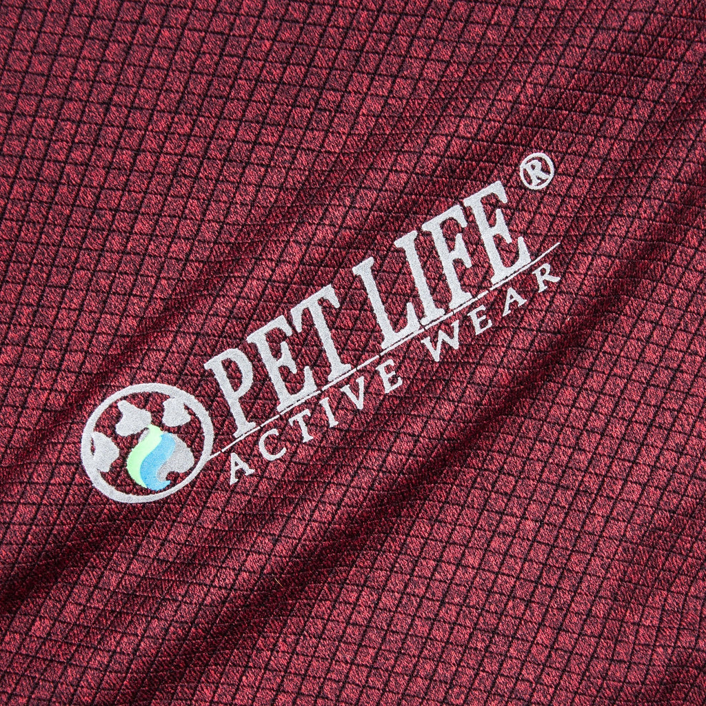 Close-up of burgundy dog polo shirt fabric with PEY LIFe Active Wear logo